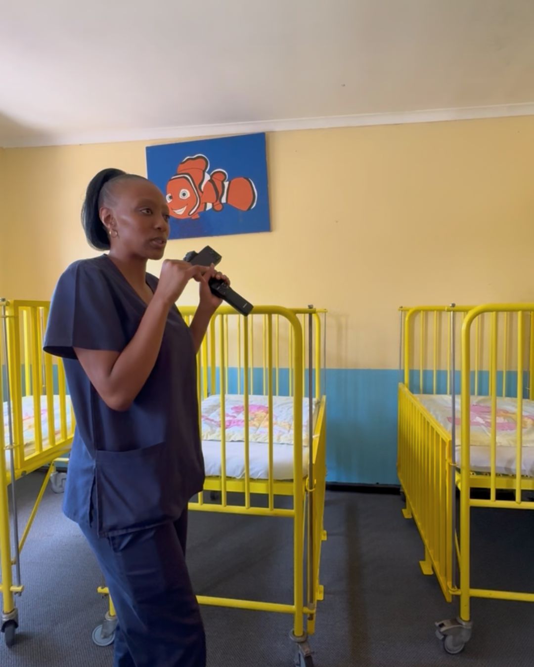 Caregiver in the nursery room