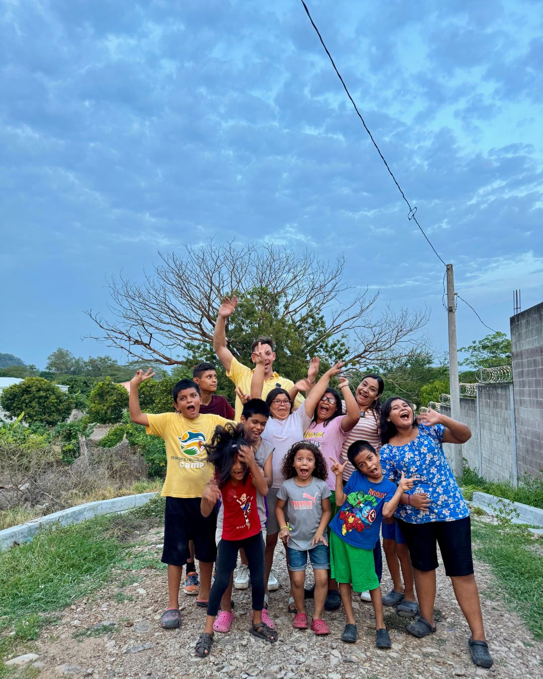 Group photo with the kids and staff