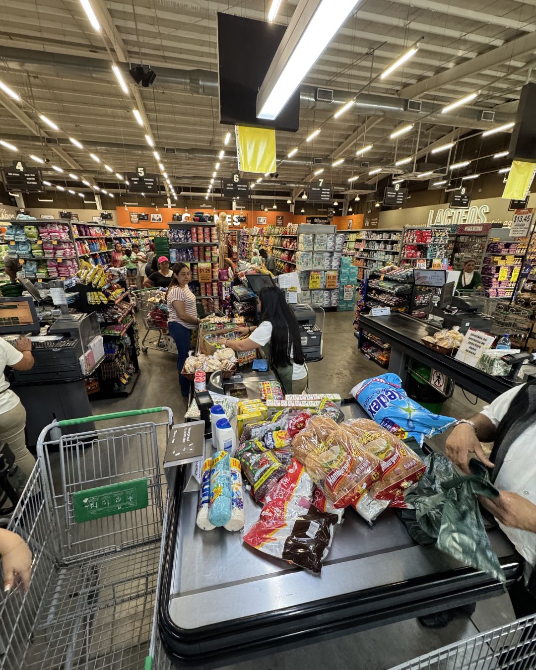 At the checkout with supplies ready to go